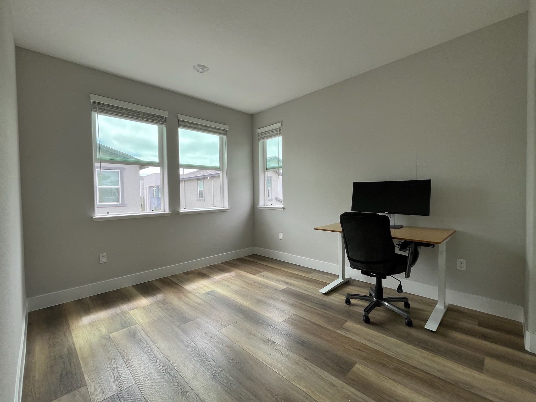 Bright bedroom with corner windows