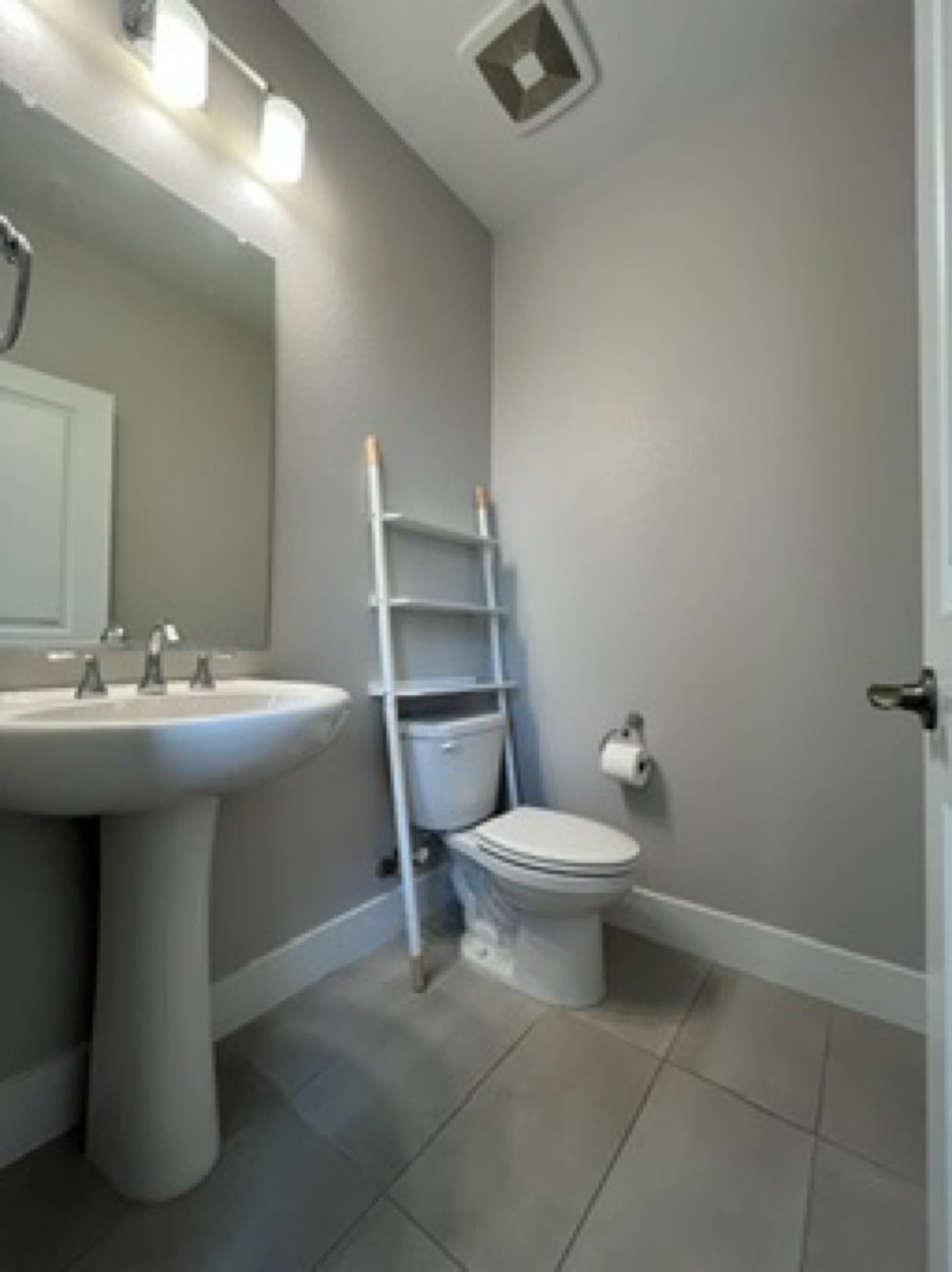 Powder room with pedestal sink