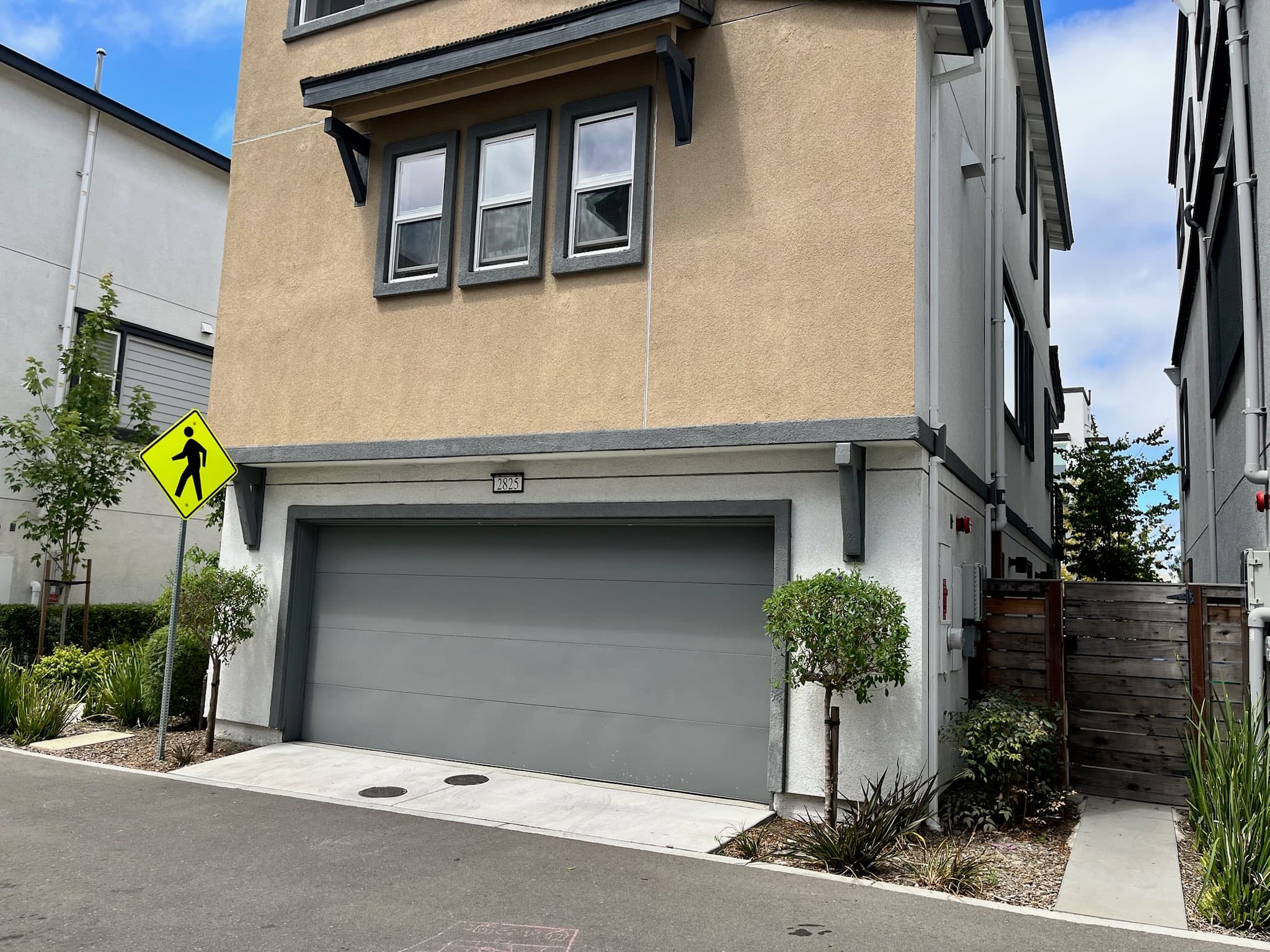 Two-car garage and gated side entry